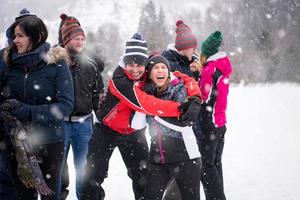 portrait of group young people in beautiful winter landscape photo