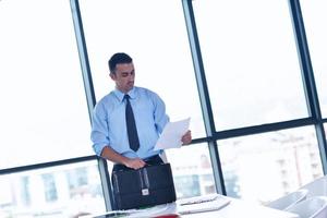 business man waiting for meeting to begin in Board room photo