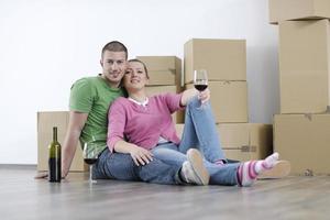 Young couple moving in new home photo