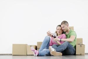 Young couple moving in new home photo