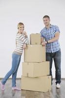 Young couple moving in new home photo