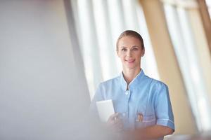 female doctor with tablet computer photo