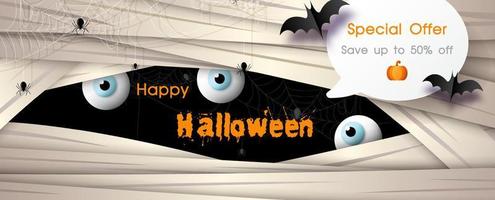 Shop banner and advertising with bats flying and Happy Halloween letters on face of giant evil background. All in banner and vector design.