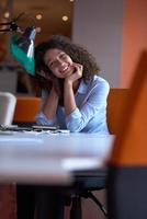 young  business woman at office photo