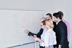 Senior business man giving a presentation photo