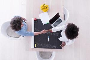 top view of Multiethnic startup business team on meeting photo