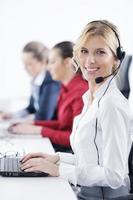 business woman group with headphones photo