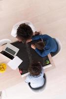 top view of Multiethnic startup business team on meeting photo