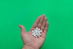 pills in hand photo