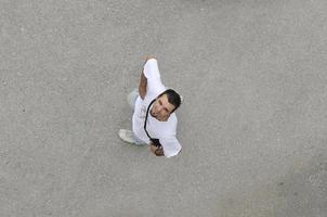 young man looking up photo