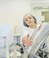 woman worker in pharmacy company photo