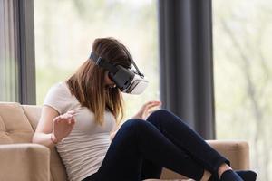 woman using VR-headset glasses of virtual reality photo