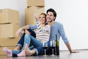 Young couple moving in new house photo