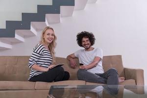 couple relaxes in the living room photo