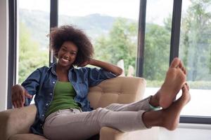 black women at home in the chair photo