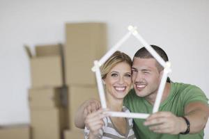 Young couple moving in new home photo