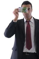 Business man holding money photo