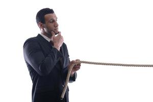 business man with rope isolated on white background photo