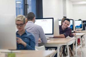 startup business, software developer working on desktop computer photo