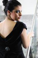 lady on black dress look back photo