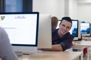 startup business, software developer working on desktop computer photo