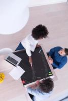 top view of Multiethnic startup business team on meeting photo