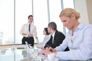 group of business people at meeting photo