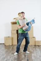 Young couple moving in new house photo