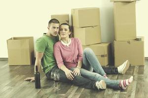 Young couple moving in new home photo