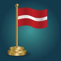 Latvia national flag on golden pole on gradation isolated dark background. table flag, vector illustration