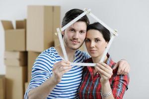 Young couple moving in new house photo