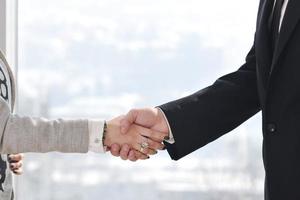 business man and woman handshake on  meeting photo