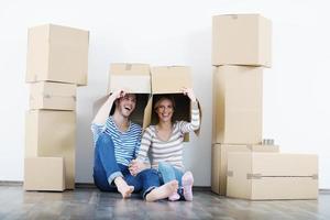 Young couple moving in new house photo