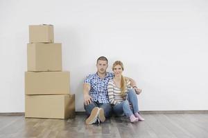 Young couple moving in new home photo