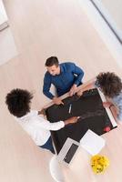 top view of Multiethnic startup business team on meeting photo