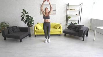 Young Woman Doing a Work Out Session At Home video