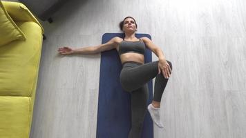 Young Woman Doing a Work Out Session At Home video