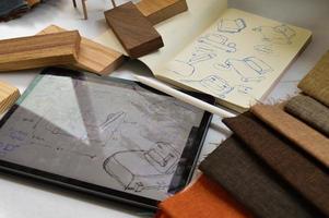 furniture design, digital drawing in tablet and analog in notebook photo