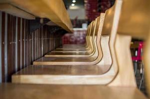 bar stools or benches, with thick pasta floor, at the back vegetation, bar and counter bar. photo