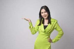 Portrait of beautiful woman over white background studio. photo