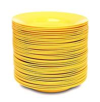 stack of yellow plate isolated on white background photo