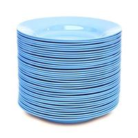 stack of blue plate isolated on white background photo