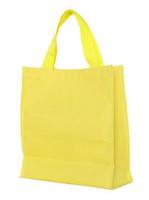 yellow canvas shopping bag isolated on white background with clipping path photo