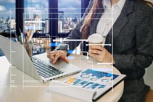 Project manager working and update tasks with milestones progress planning and Gantt chart scheduling diagram. business working with smart phone, tablet and laptop in office. photo