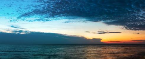 Panorama clouds in the blue sky in sunset time photo