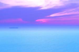 Seascapes of beautiful sunset on the sea with colorful sky on vacation photo