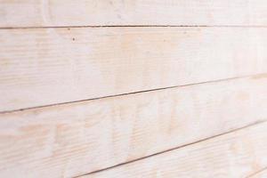 Vintage colored wood background texture with knots and nail holes. Old painted wood wall. Wooden dark horizontal boards. Front view with copy space. photo