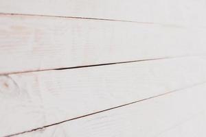 textura de fondo de madera de color vintage con nudos y agujeros de clavos. antigua pared de madera pintada. tableros horizontales oscuros de madera. vista frontal con espacio de copia. foto