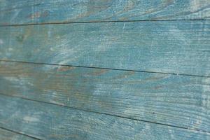 textura de fondo de madera de color vintage con nudos y agujeros de clavos. antigua pared de madera pintada. tableros horizontales oscuros de madera. vista frontal con espacio de copia. foto