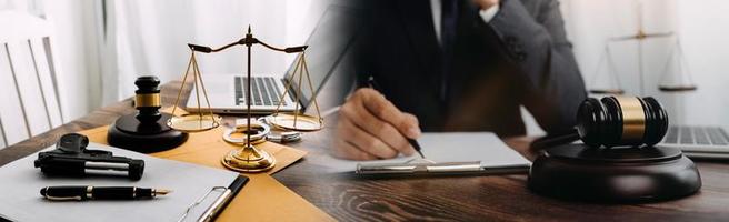 Business and lawyers discussing contract papers with brass scale on desk in office. Law, legal services, advice, justice and law concept picture with film grain effect photo